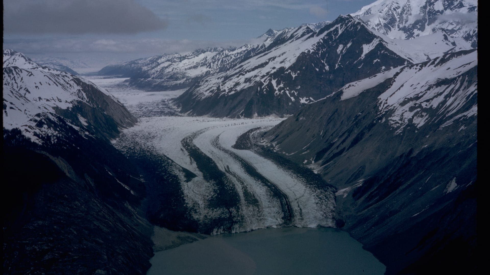 Cruise ship navigating the scenic fjords of Southeast Alaska